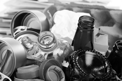 Operatives starting a house clearance with PPE and a van in Swiss Cottage